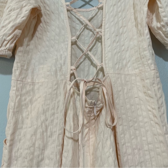 ASOS DESIGN Seersucker Lace Up Back Jumpsuit In Blush - Picture 7 of 14